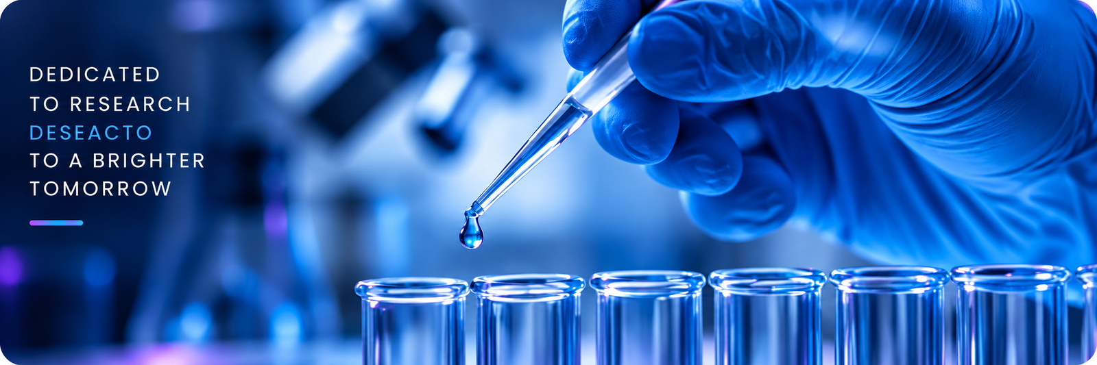 Dedicated to research, to a brighter tomorrow: gloved hand placing a drop into laboratory test tubes